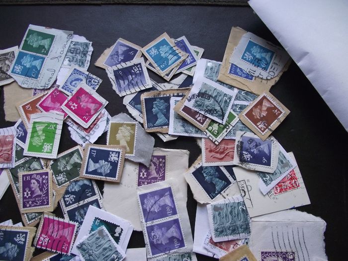 A box with collection of stamps from Great Britain