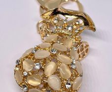 Created White Cats Eye, White Austrian Crystal Vas Keychain In Yellow Gold Tone