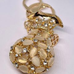 Created White Cats Eye, White Austrian Crystal Vas Keychain In Yellow Gold Tone