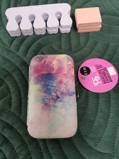 Manicure set, pedicure items, body roller and scrub.
