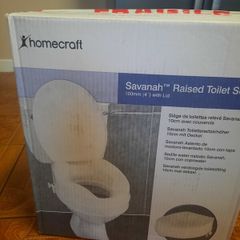 Raised toilet seat