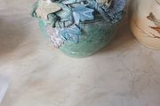Decorative Ceramic Vase With 3 D Flower Pattern.