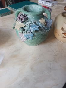 Decorative Ceramic Vase With 3 D Flower Pattern.