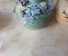 Decorative Ceramic Vase With 3 D Flower Pattern.