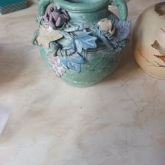 Decorative Ceramic Vase With 3 D Flower Pattern.