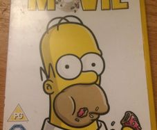 Three (3) Cartoon Movies  on  DVD The Simpson's, Daffy Duck & Road Runner