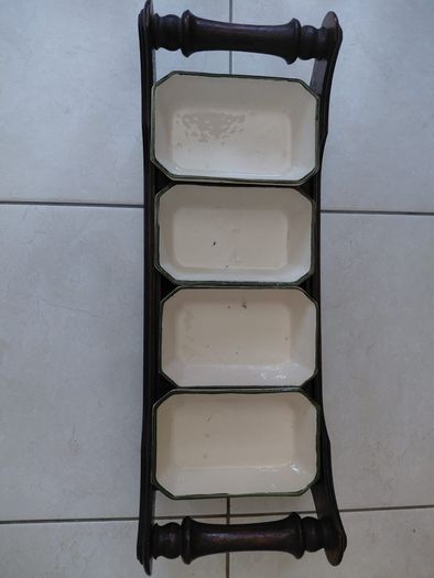 Vintage wooden serving tray with four ramekins