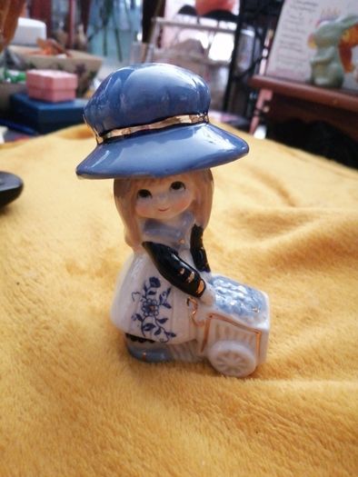 Porcelain girl figurine
