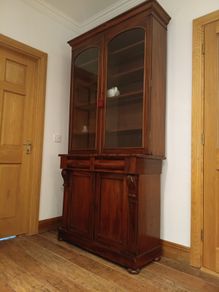 Two-door antique Victorian mahogany bookcase
