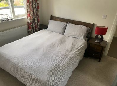 King size wooden bed with mattress and lockers