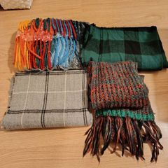 Four women scarves for sale.