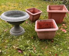 Selection of plastic garden pots