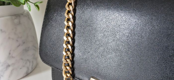 Michael Kors black bag gold hardware
