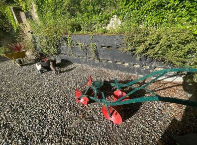 antique plough and turnip presser