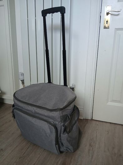 Bag on castors lots of pockets perfect for camping, shopping or arts and crafts storage