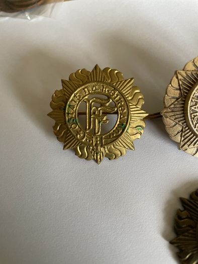 Irish Army cap badges three brass one staybrite