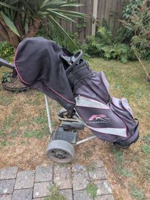 ladies Golf clubs and trolley
