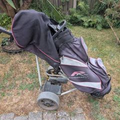 ladies Golf clubs and trolley