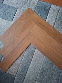 New boxed Herringbone laminate flooring