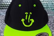 Smiley face snapback cap