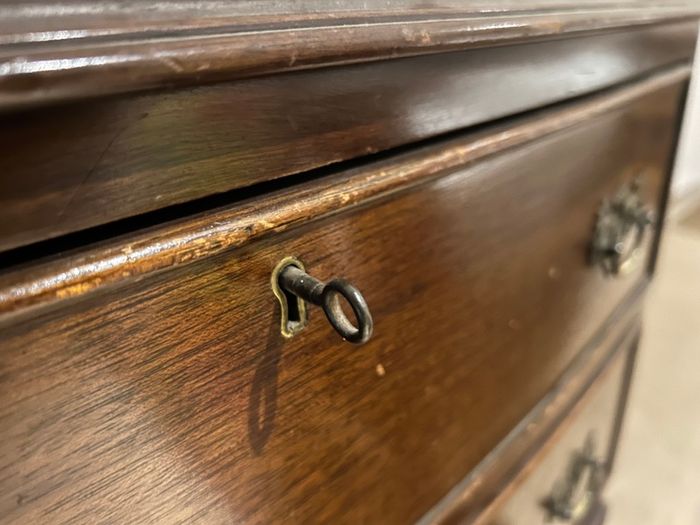 Traditional dark wood chest of drawers