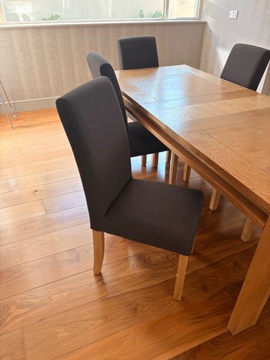 Solid oak dining table and 6 chairs