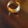 gold tone bangle Image 2