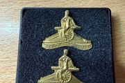 Vintage Irish Defence Forces Artillery Corps collar badges