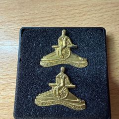 Vintage Irish Defence Forces Artillery Corps collar badges