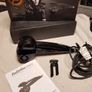 BaByliss PRO Perfect Curl styling tool, highlighting its "Auto Curl technology for creating effortless curls. Image 4
