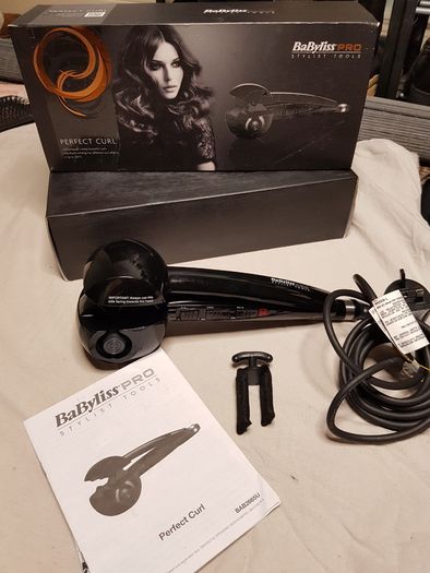 BaByliss PRO Perfect Curl styling tool, highlighting its "Auto Curl technology for creating effortless curls.