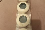 Four ceramic T light holders