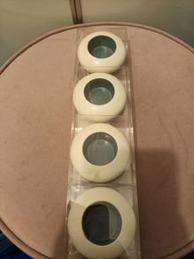 Four ceramic T light holders