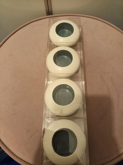 Four ceramic T light holders