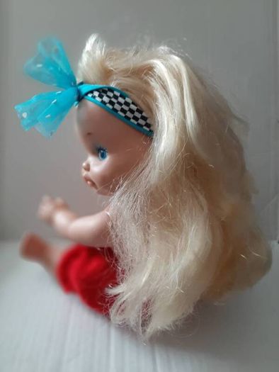 collectable vintage matel doll in original clothes