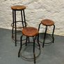 Set of 3 Vintage Industrial Stools. Image 2