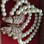 A beautiful faux pearl butterfly bracelet. Image 8