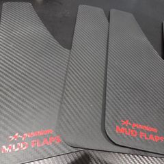 Four Carbon fibre style universal mudflaps