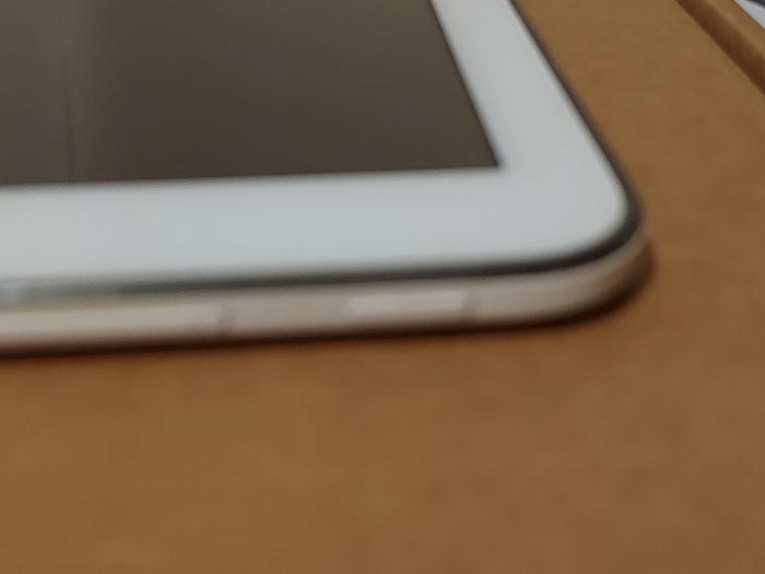 Samsung Galaxy Tab 4, Model SM-T530, 16GB, White, working great, in excellent condition and with a bunch of Family-children  movies