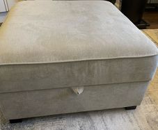 Grey footstool with storage