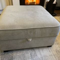 Grey footstool with storage