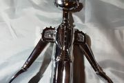 four bottle openers including 1 bugs bunny