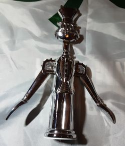 four bottle openers including 1 bugs bunny