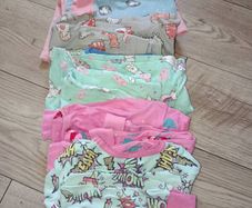 Small bundle of baby girl's clothes