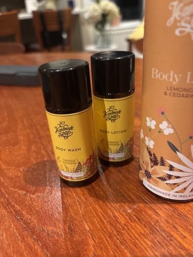 Brand new The Handmade Company- Lemongrass and Cedarwood Body Lotion and 2 Free Travel size Body Wash and Body Lotion