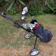 Cheap set of golf clubs and trolley