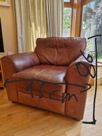 brown leather sofa and arm chair