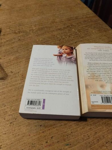 2 paperback books, true story