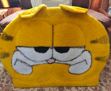 Free Garfield single bed headboard.  Missing wooden pieces to attach to the bed.
