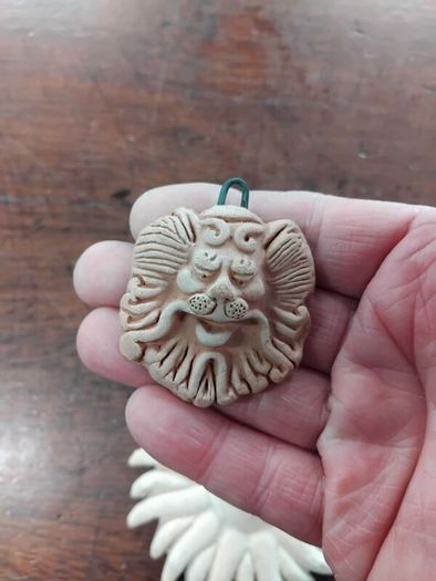 Two Terracotta Faces